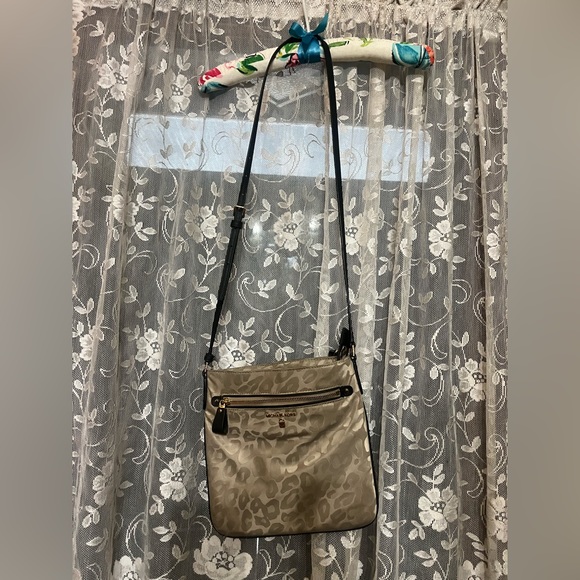 MICHAEL Michael Kors Handbags - Gently used in Michael Kors cream, colored Crossbody, leopard print purse